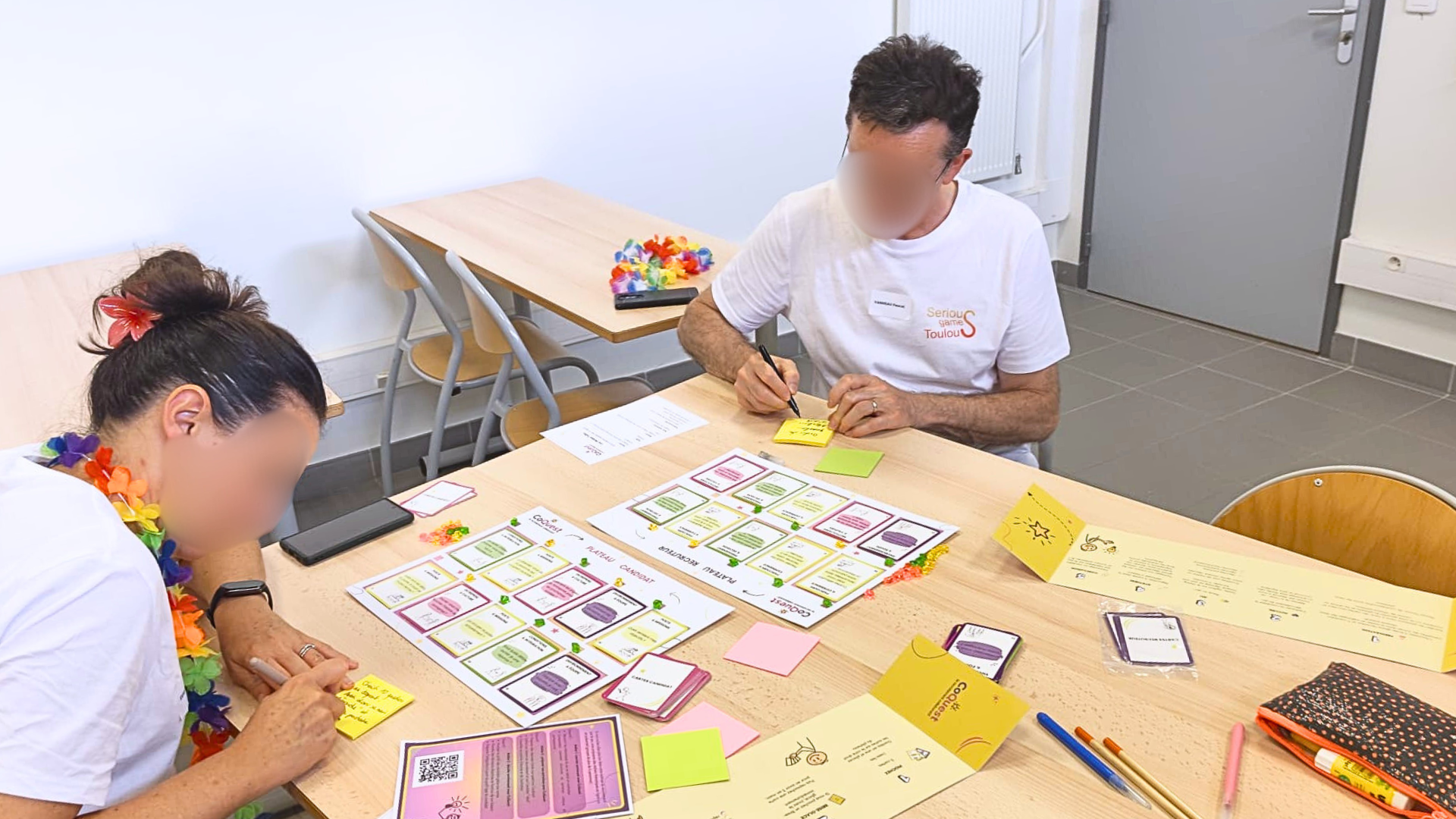 Atelier Let's Co CoQuest : participants autour du plateau de jeu